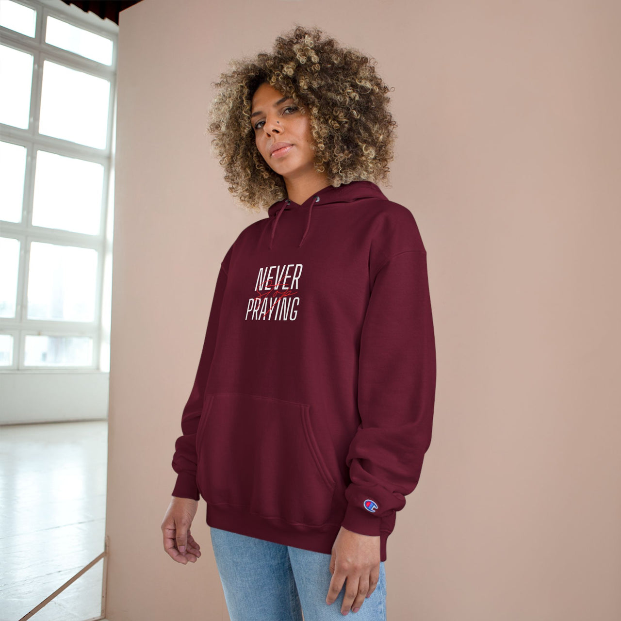 NEVER STOP PRAYING - CHAMPION HOODIE