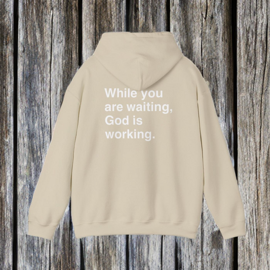 WHILE YOU ARE WAITING, GOD IS WORKING - HOODIE